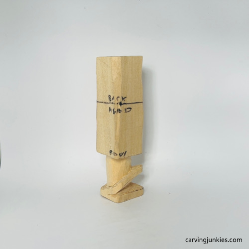 Back view of legs on wooden gnome