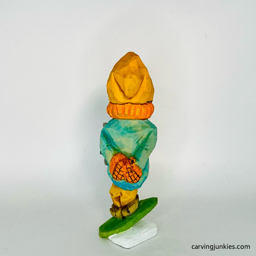 Back view of painted wooden gnome