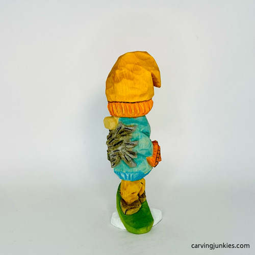 Left side of painted wooden gnome