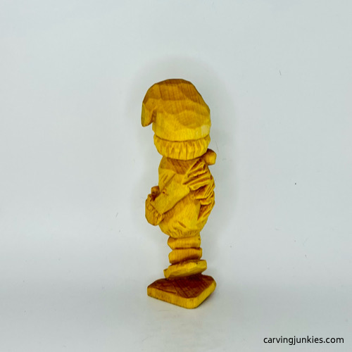 Right view of unpainted wooden gnome