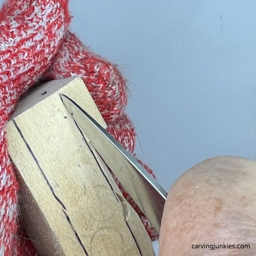 Carving side of wooden pie carving