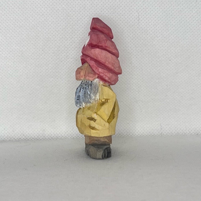 Left view of painted wood carved gnome
